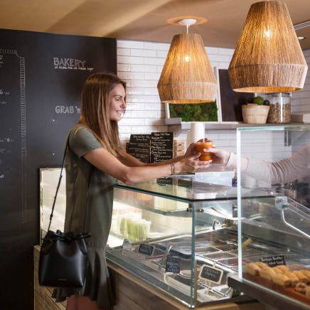 woman ordering food at neighbors cafe